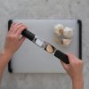 Stiskalnik za česen GOOD GRIPS, 18 cm, črna, iz nerjavečega jekla, OXO