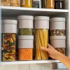226269 3 doza na potraviny flip storage 1 6 l zelena plast lekue